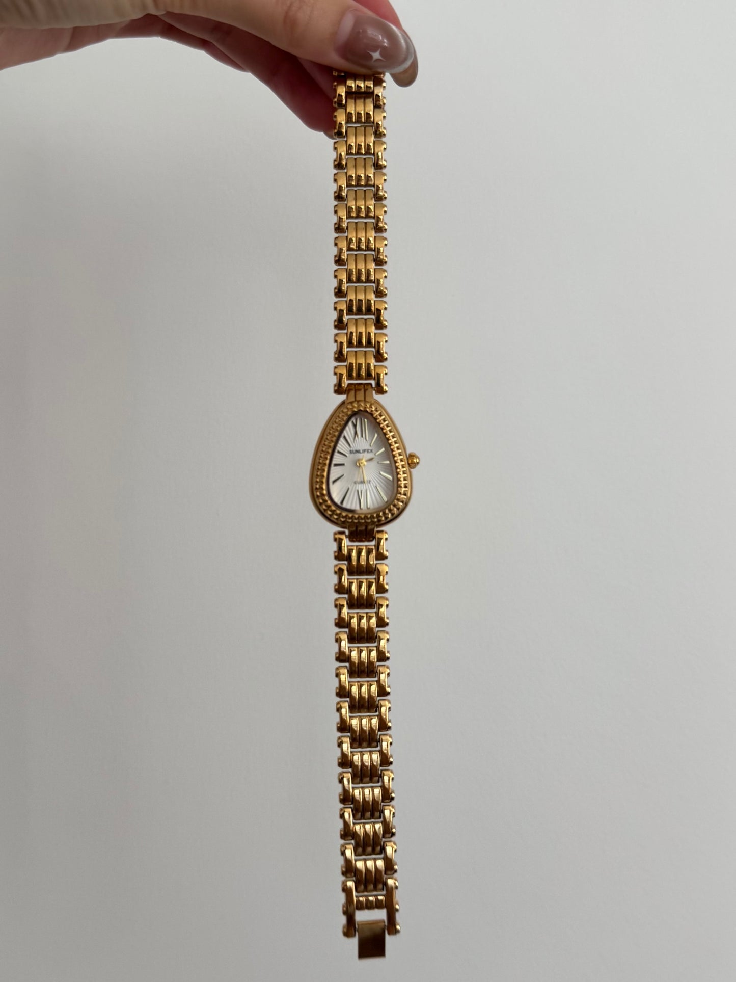 Intricate Gold Toned Serpenti Watch