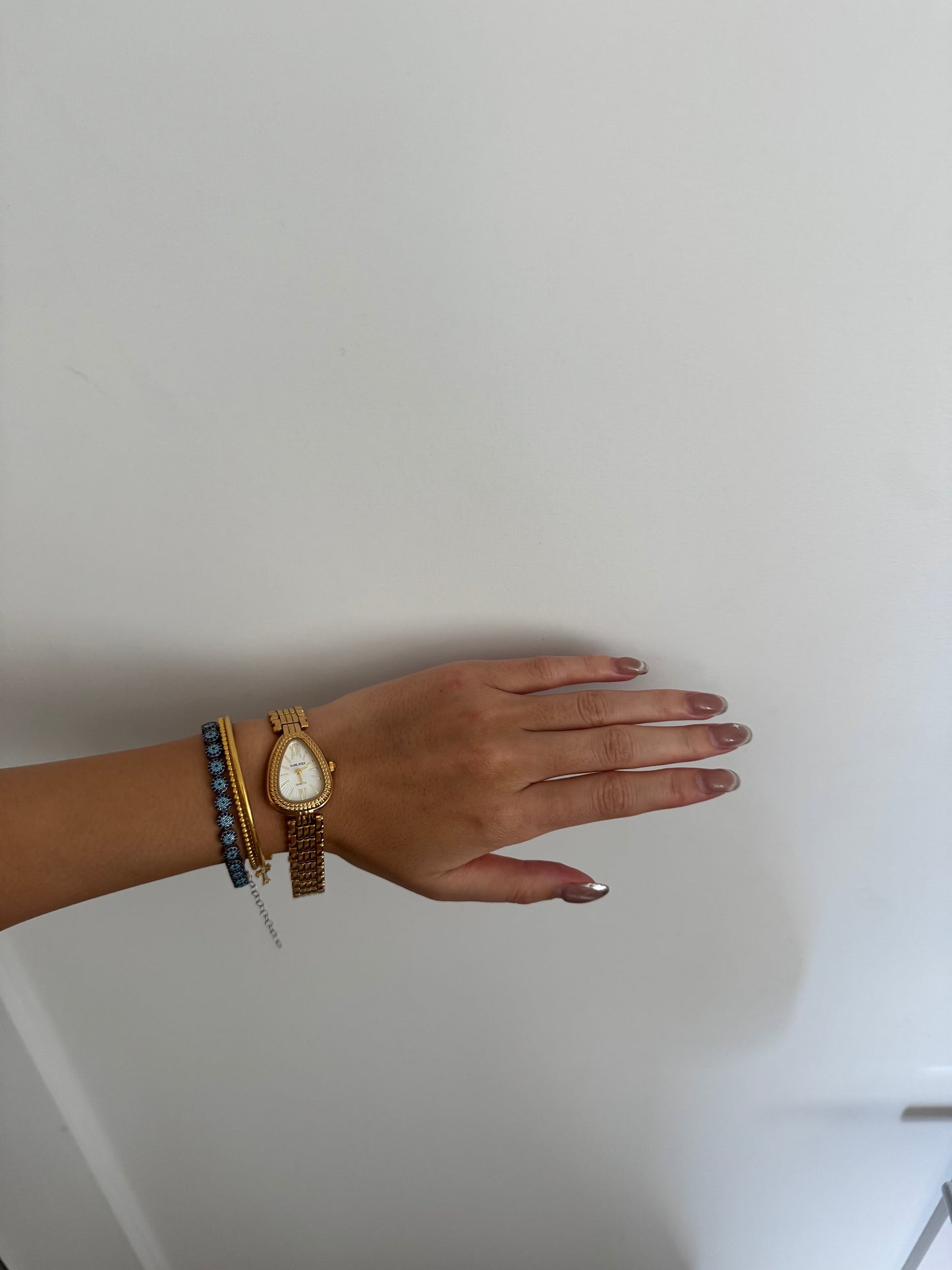 Intricate Gold Toned Serpenti Watch