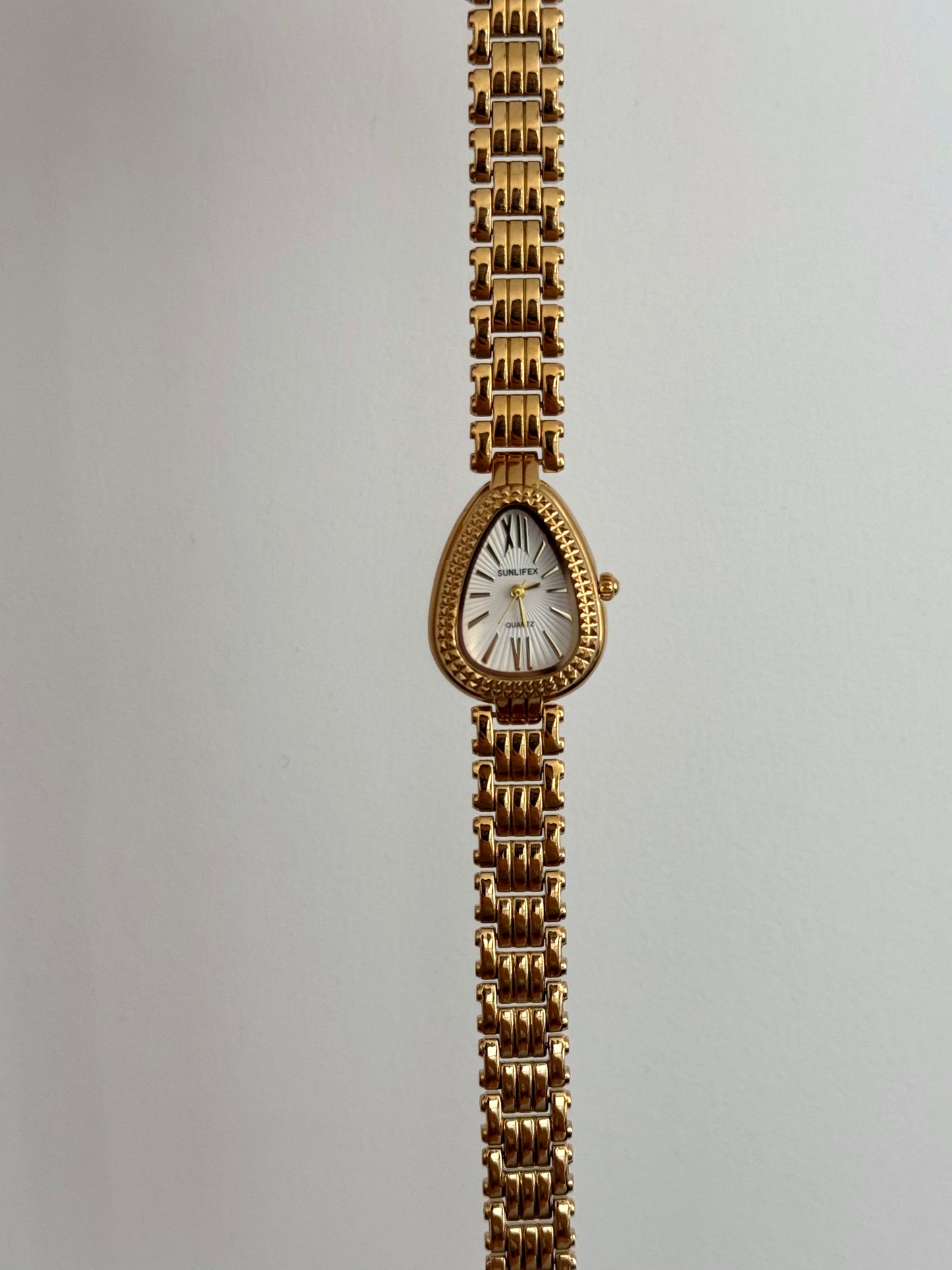 Intricate Gold Toned Serpenti Watch
