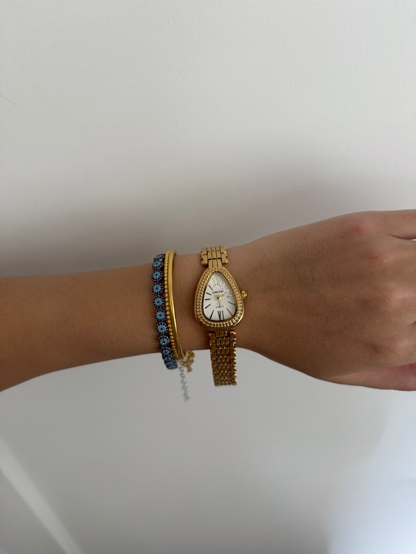Intricate Gold Toned Serpenti Watch