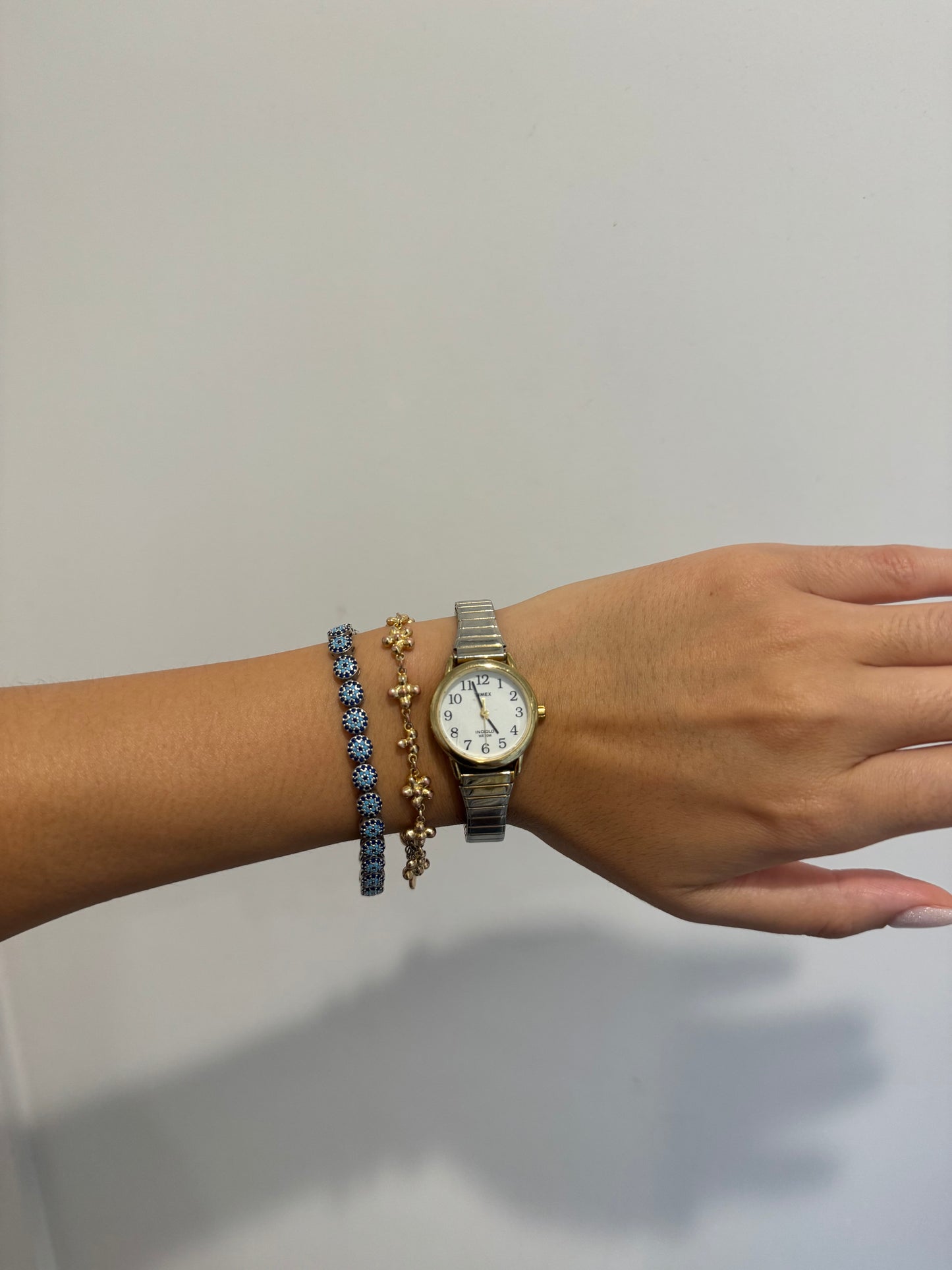 Dainty Circular Timex Gold Toned Expandable