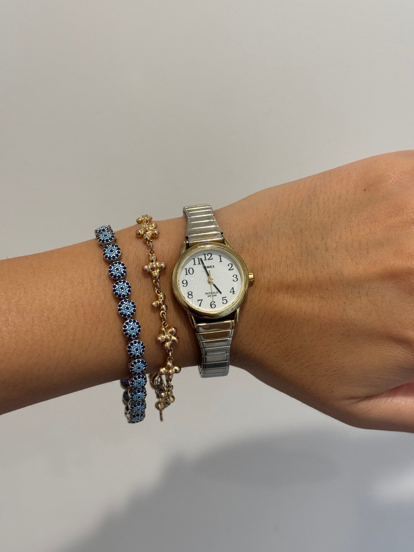 Dainty Circular Timex Gold Toned Expandable