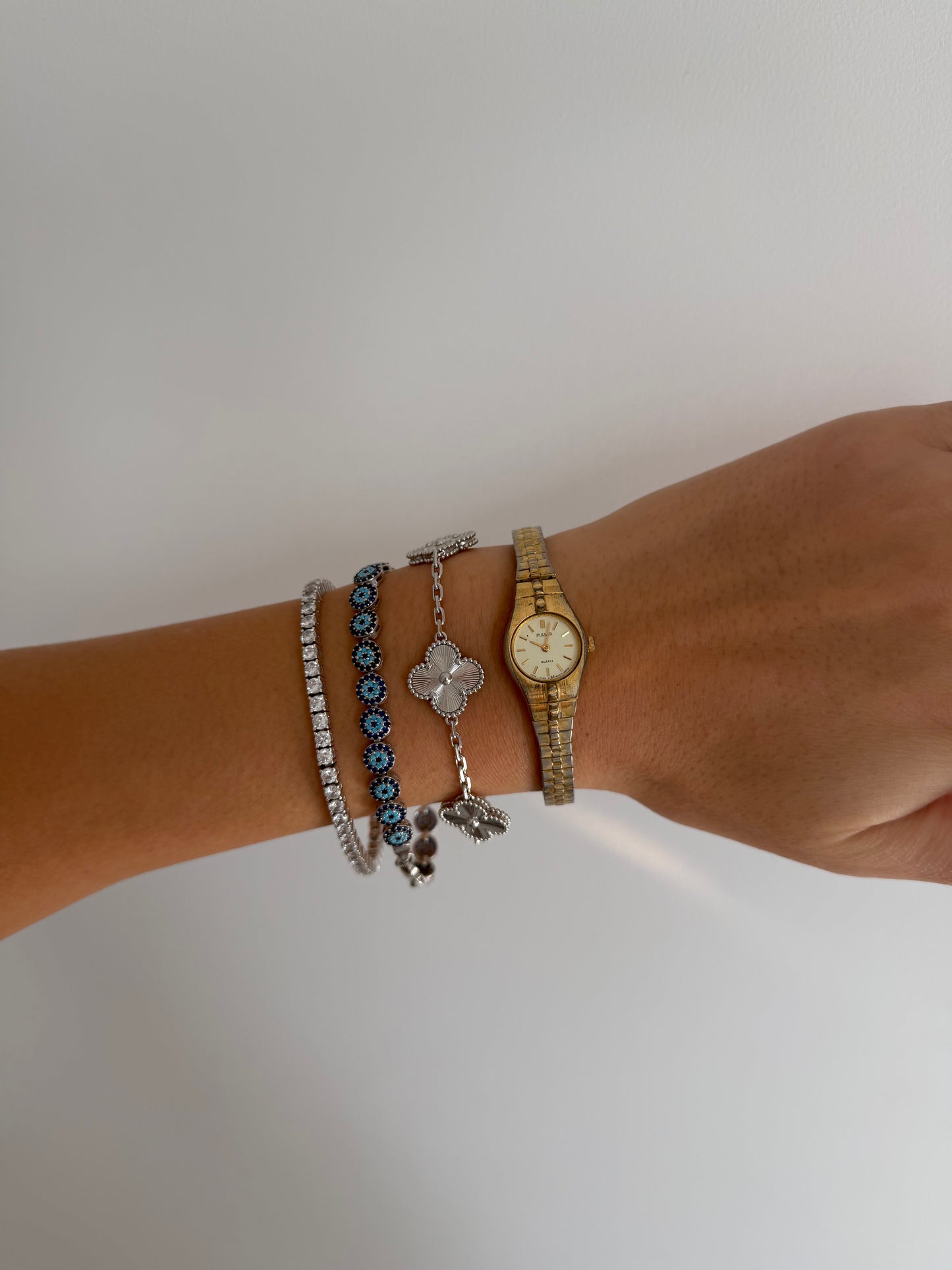 Dainty Pulsar Gold Toned Expandable Watch