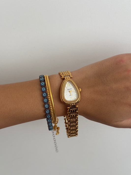 Intricate Gold Toned Serpenti Watch