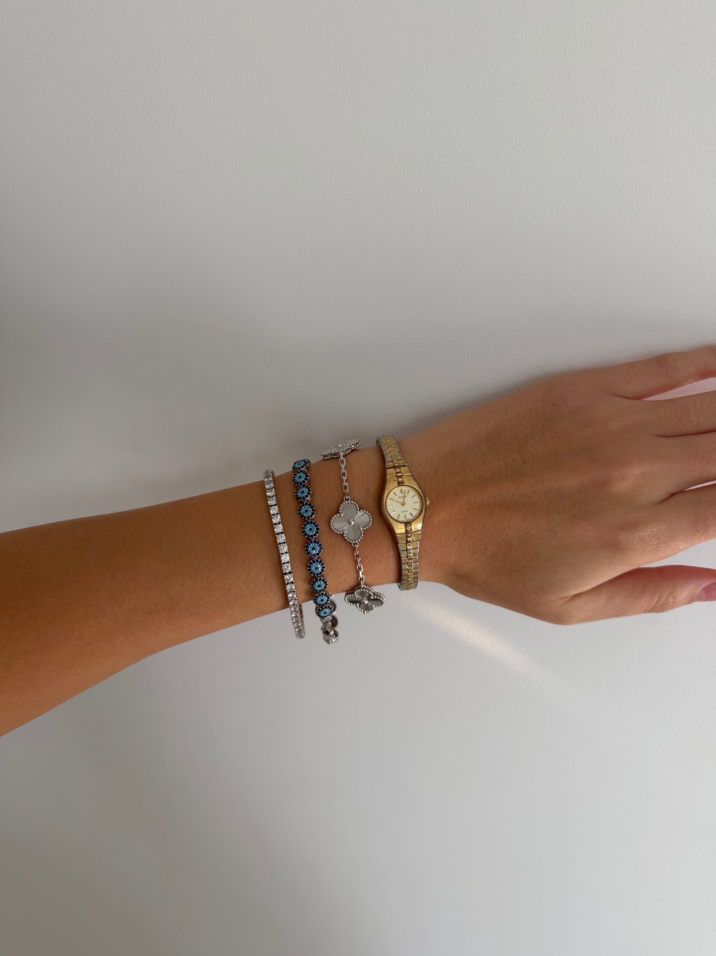 Dainty Pulsar Gold Toned Expandable Watch